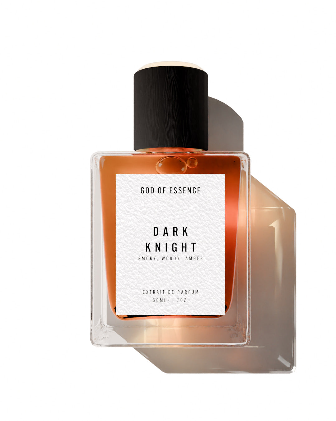 dark knight extrait de parfum bottle on black with gold accent