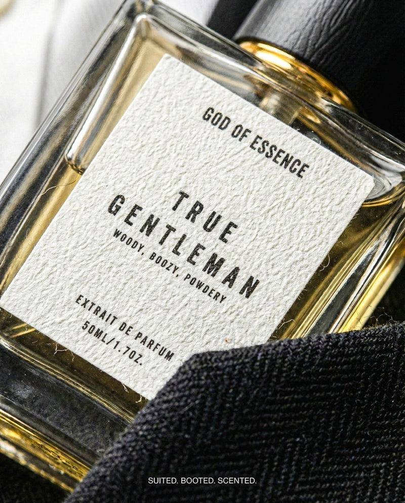 True Gentleman powdery iris perfume for men on a tailored jacket, old money fragrance by God of Essence
